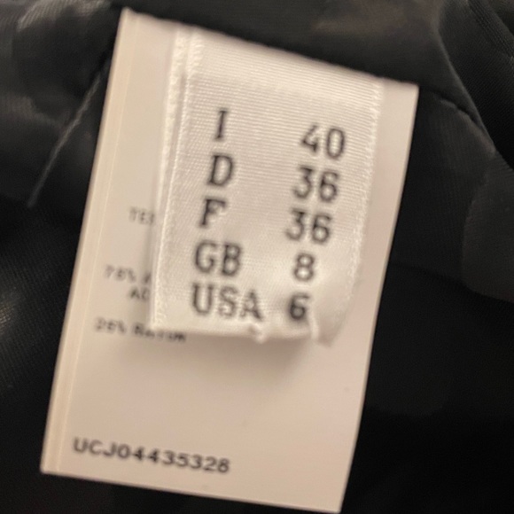 Emanuel Ungaro
Leather-Trimmed Ruffled Dress
Size: MIUS8, FR40 color Black - Picture 5 of 9